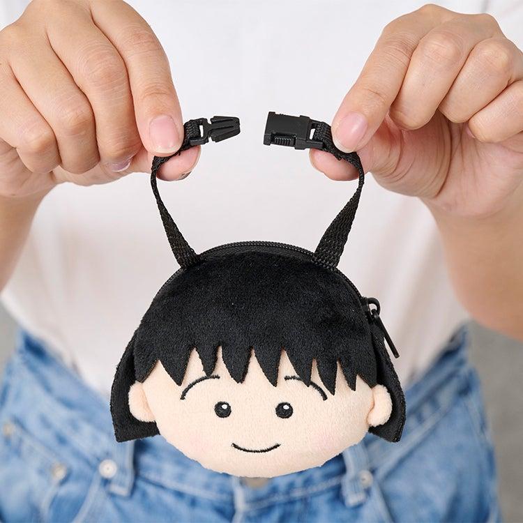 Face-shaped bag charm