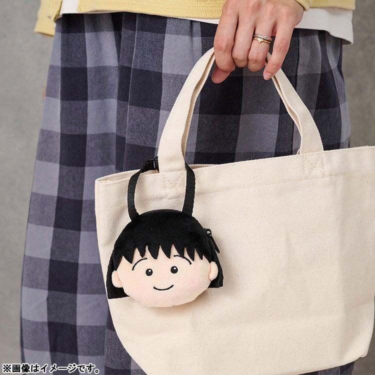 Face-shaped bag charm